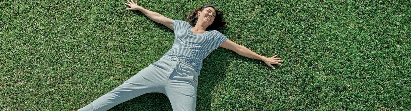 Woman Laying on Sapphire Buffalo Turf